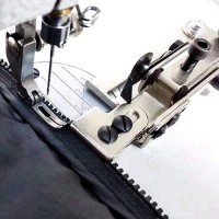 Пристосування для вшивання блискавки